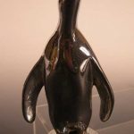 A Louis Lejeune penguin car mascot